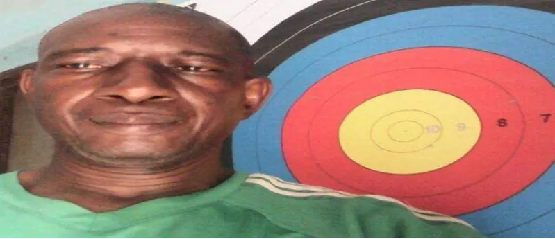 A Nigerian archer at full draw