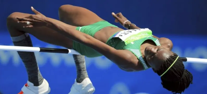 A Nigerian high jumper clearing the bar