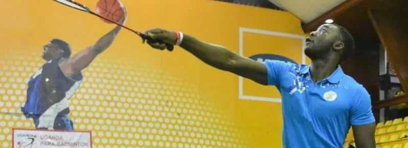 A Nigerian badminton player reaching for a shot