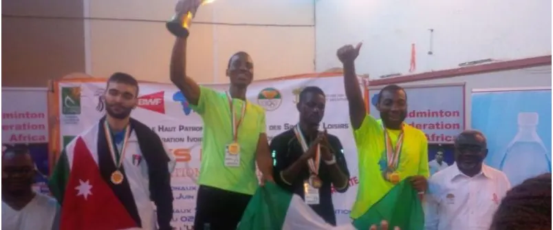 Nigerian badminton players with medals and trophies
