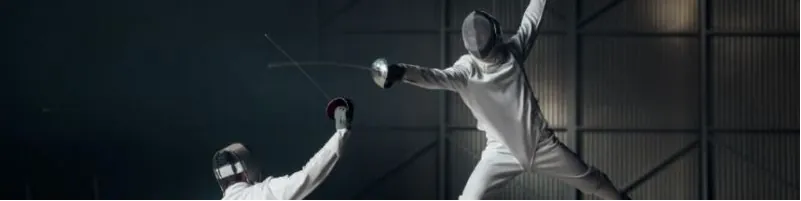 A fencer lunging at an opponent