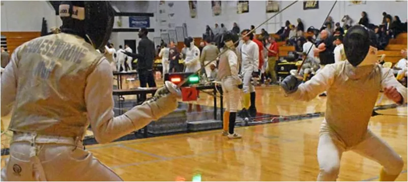 Nigerian fencers in a bout at a national championship
