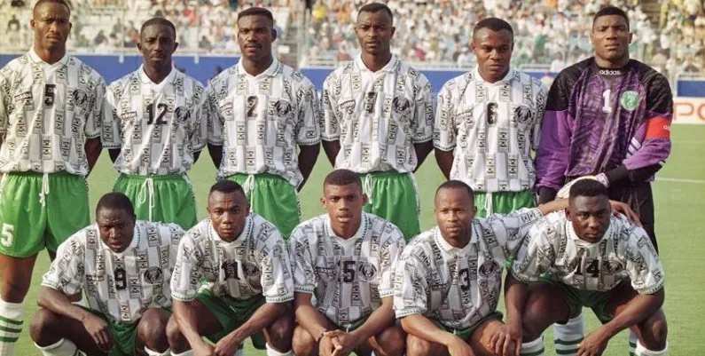 A Nigerian national team of the 1990s posing for a team photo