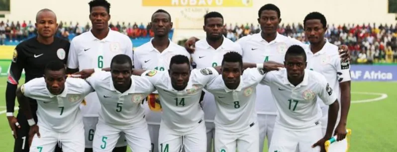The Super Eagles in white lined up for a team photo