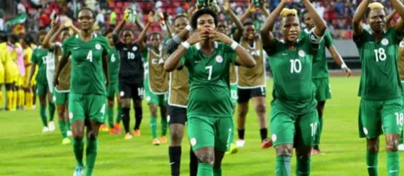 Super Falcons players applauding fans after a match