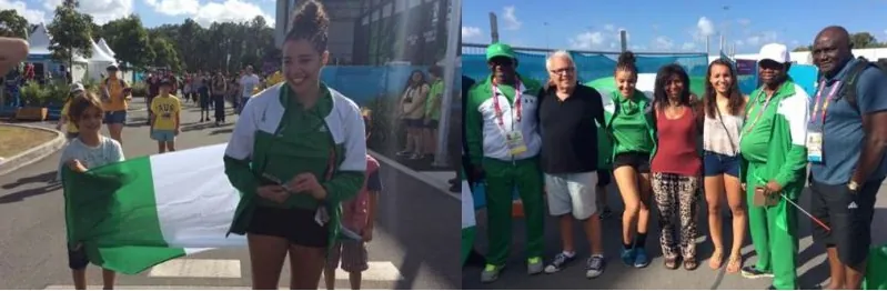 Nigerian gymnasts and officials with the national flag at the Commonwealth Games
