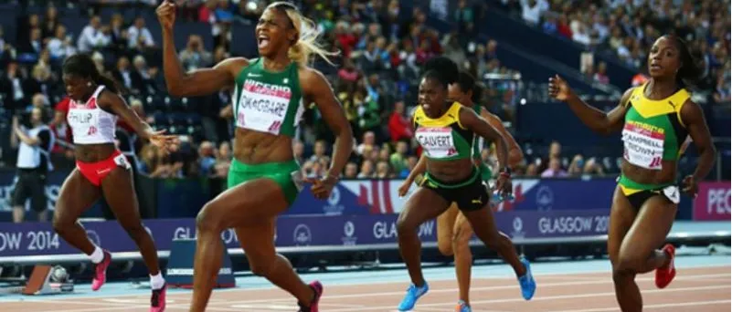 Nigerian sprinters racing in a relay final