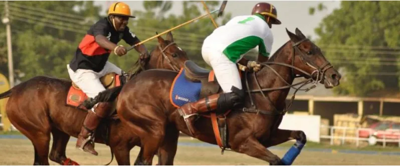 Polo players chasing the ball at a Nigerian tournament