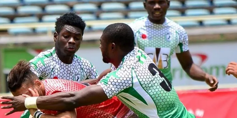 Nigerian defenders making a tackle at an African sevens tournament