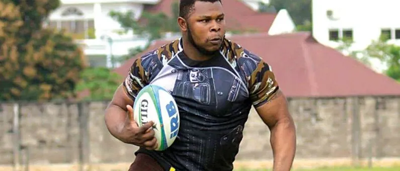 A Nigerian forward charging forward with the ball