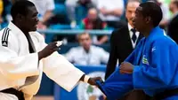 Two judokas gripping during a contest