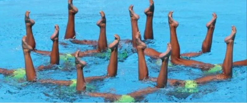 Nigerian artistic swimmers performing in the pool