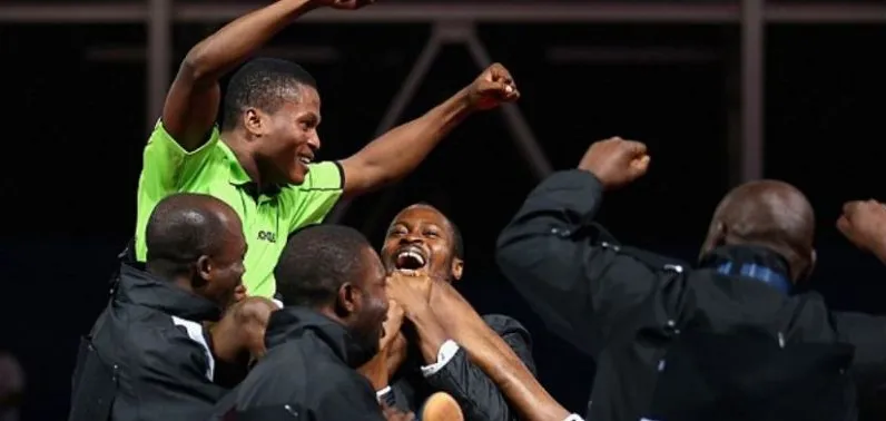 Nigerian players and coaches celebrating a team win