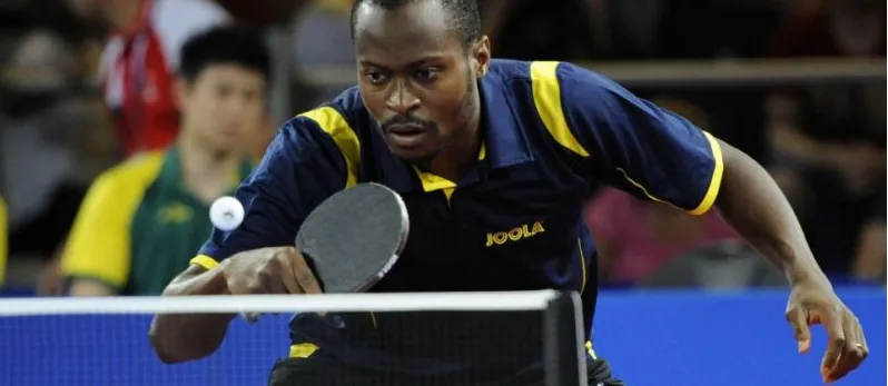 Quadri Aruna stretches to return a shot at an international tournament