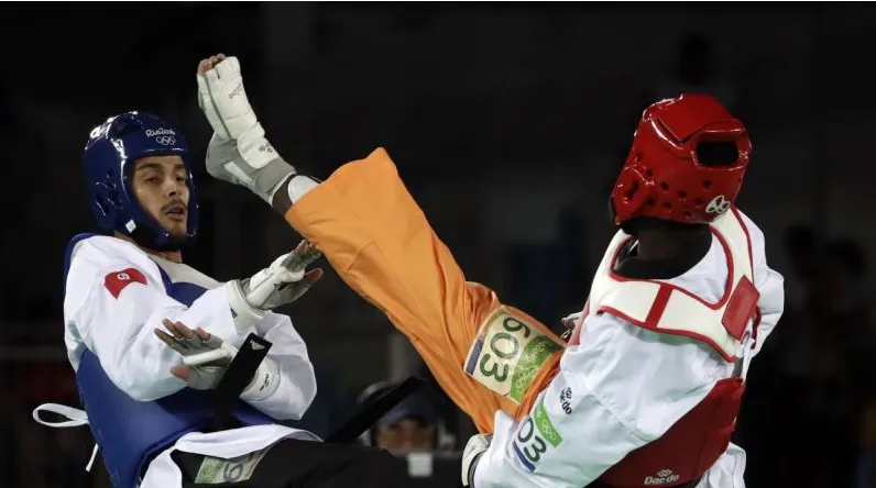 An African Games-style bout with a spinning kick