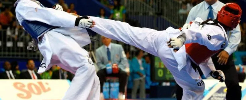 A high kick at an international taekwondo tournament